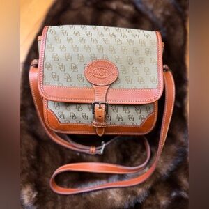 Vintage Dooney & Bourke Brown and Tan monogram canvas crossbody bag .